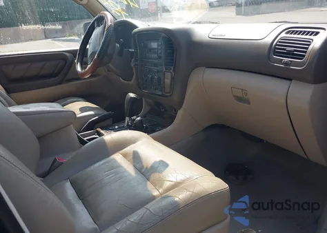 1999 Toyota Land Cruiser z USA, uszkodzony, nr VIN JT3HT05J5X0060043